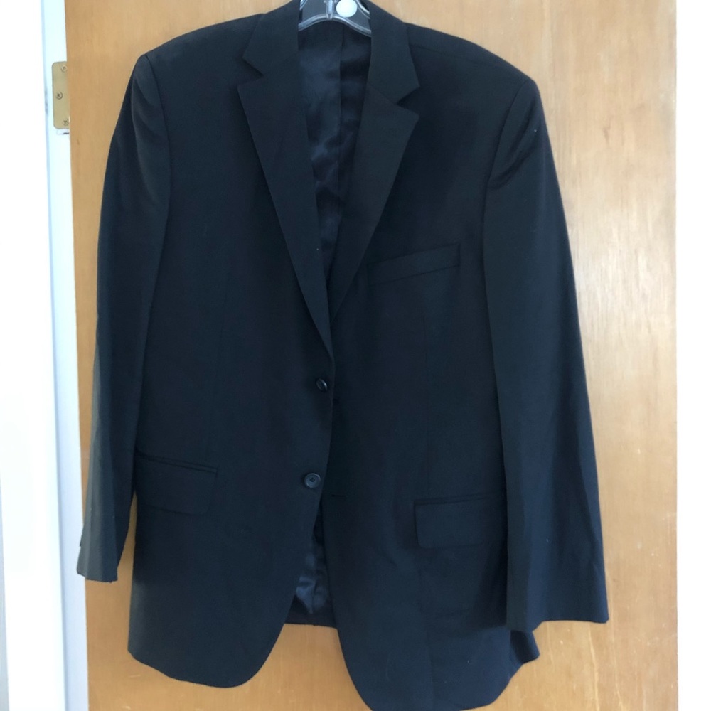 Men’s suit jacket, vest, and white shirt